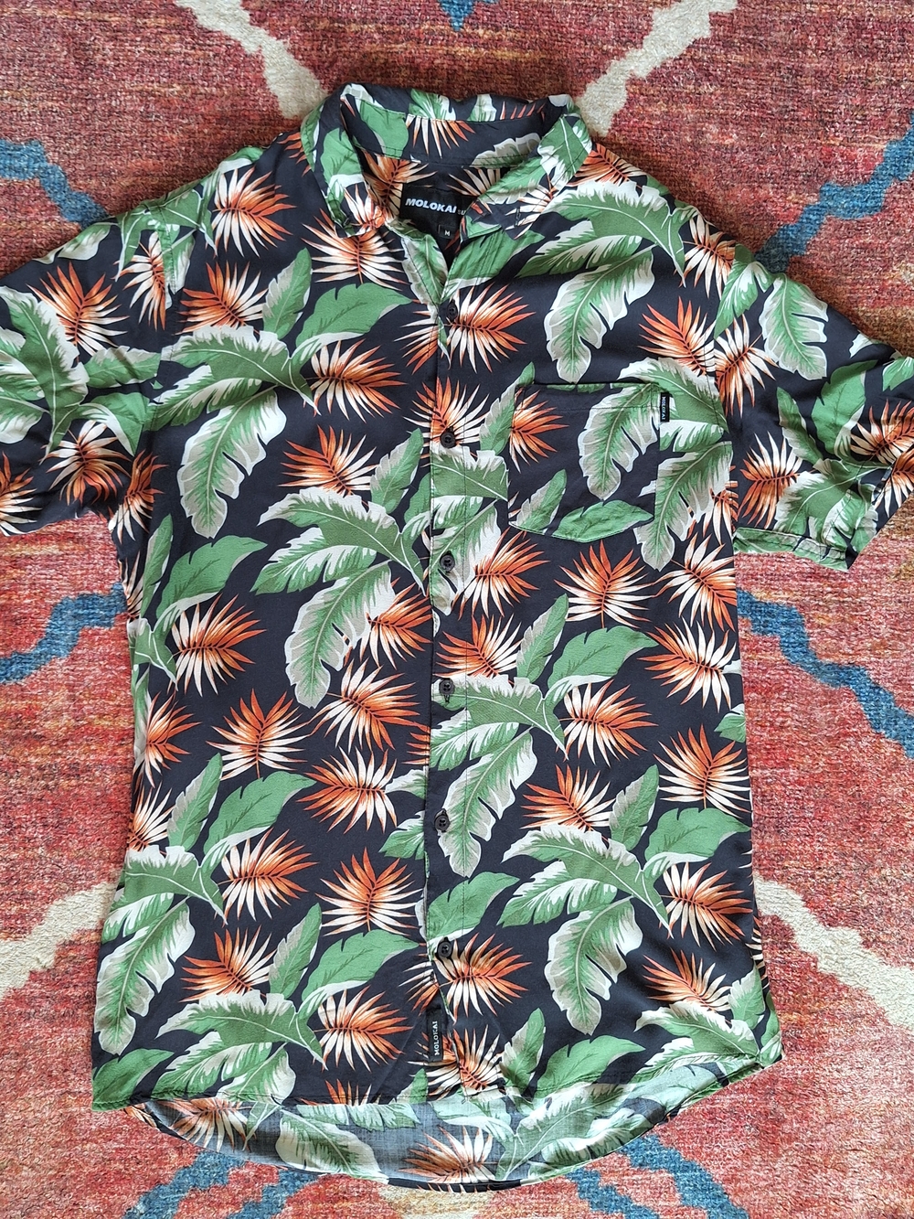 Molokai Black Tropical Leaf Short Sleeve Hawaiian Shirt with Orange Bloom